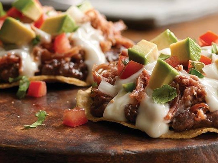 Mexican tostadas served on wood
