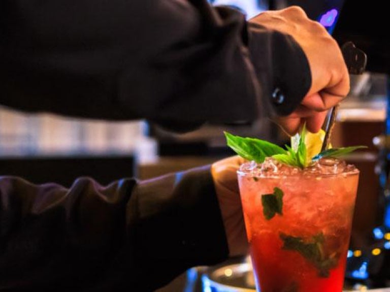 bartender making a mocktail
