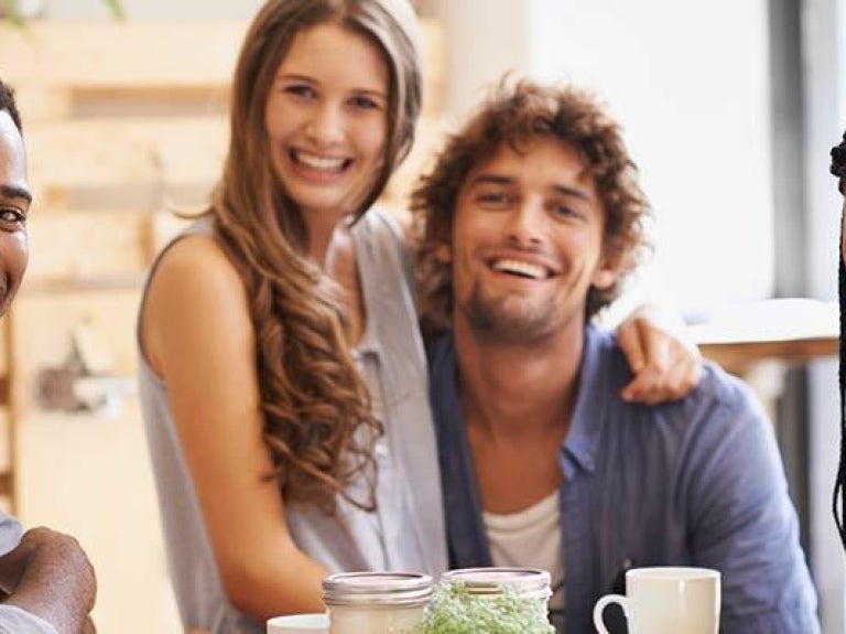 Group of millennials with beverages at cafe and restaurant