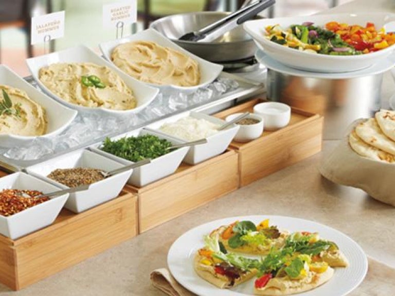 Wellness-focused action station with naan and hummus