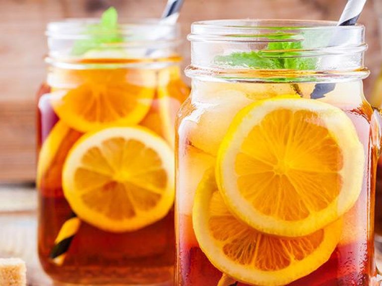 Jars of berry-infused iced tea