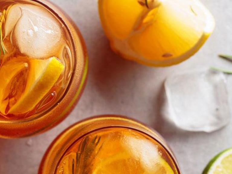 Looking into glasses of rosemary iced tea