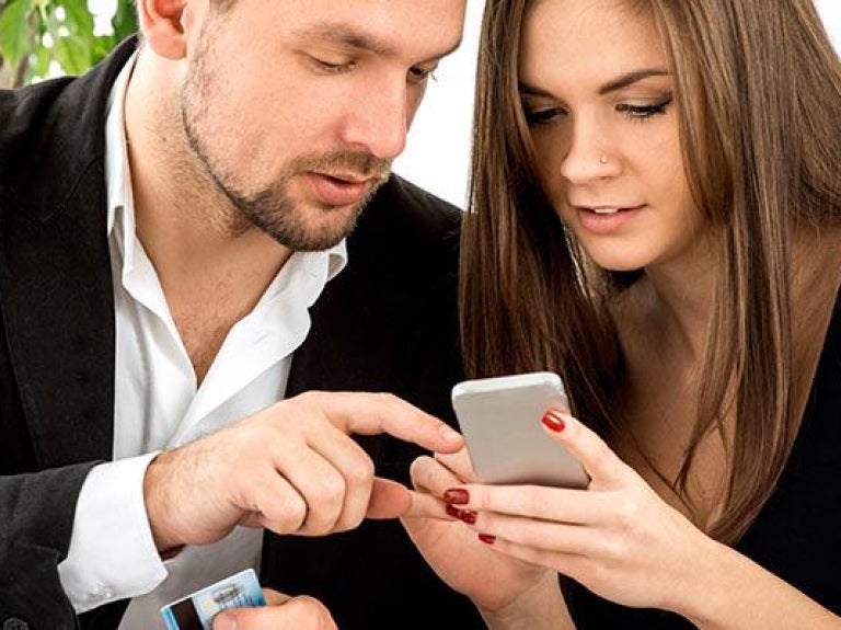 Couple reviewing the bill in a restaurant