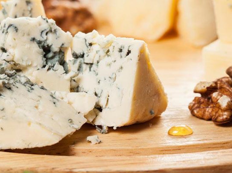 Shareable cheese plate with fruits and nuts