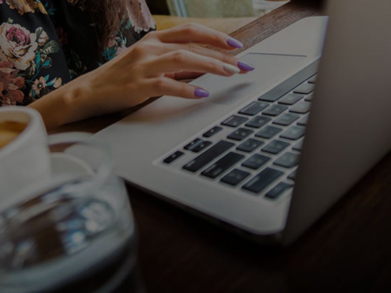drinking coffee while on the computer