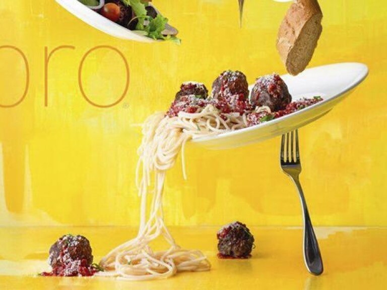Plate of spaghetti tipping and falling