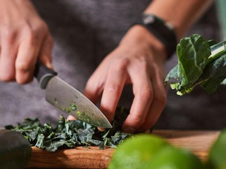 Person chopping vegetables