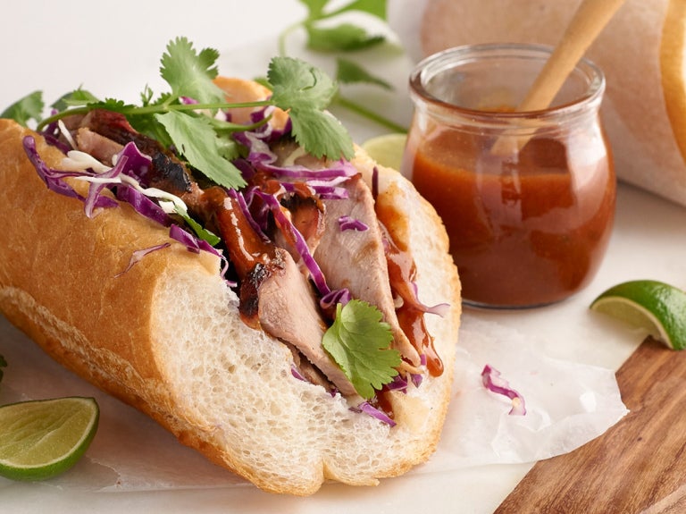 Sub sandwiches on cutting board