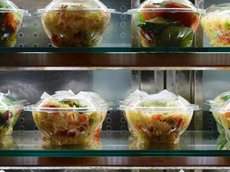 Prepackaged salads on shelf