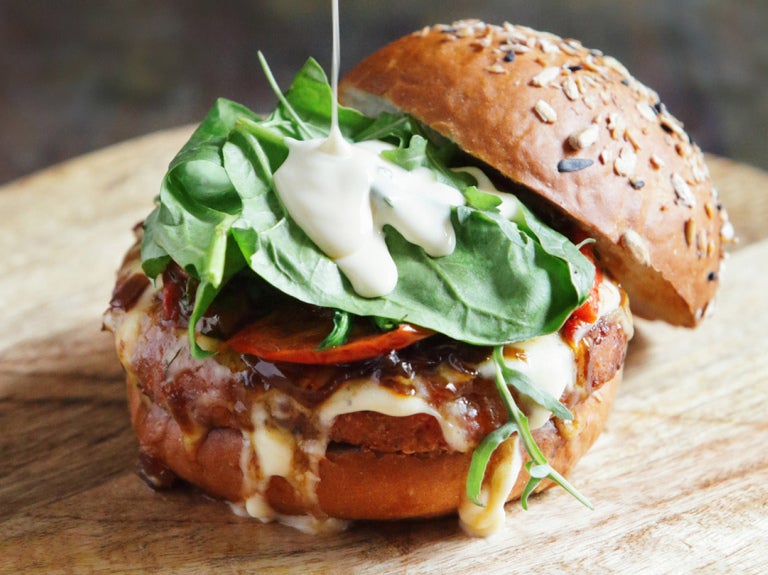 Sandwich with lettuce and mayo with bun half off