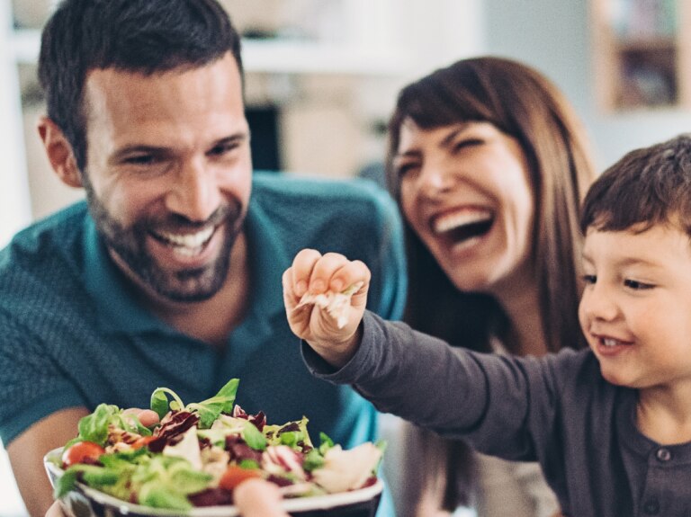 Man Woman and Child Eating Healthy Food Together