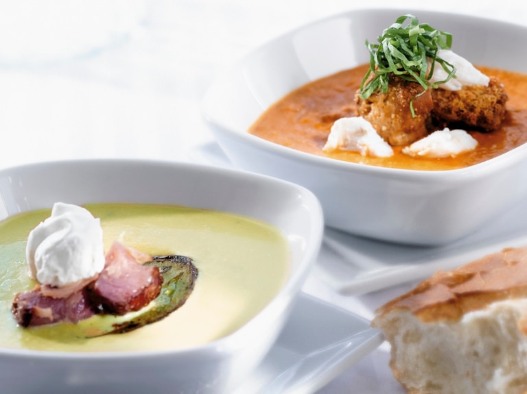 Bowls of soup in white bowl