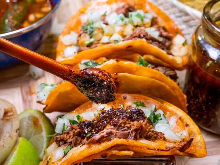 Tacos being filled