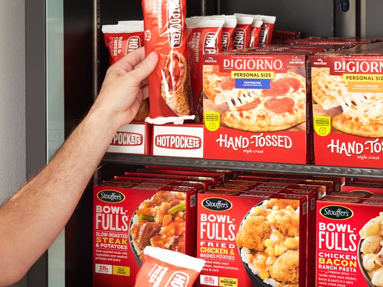 man reaching for hot pocket grab and go