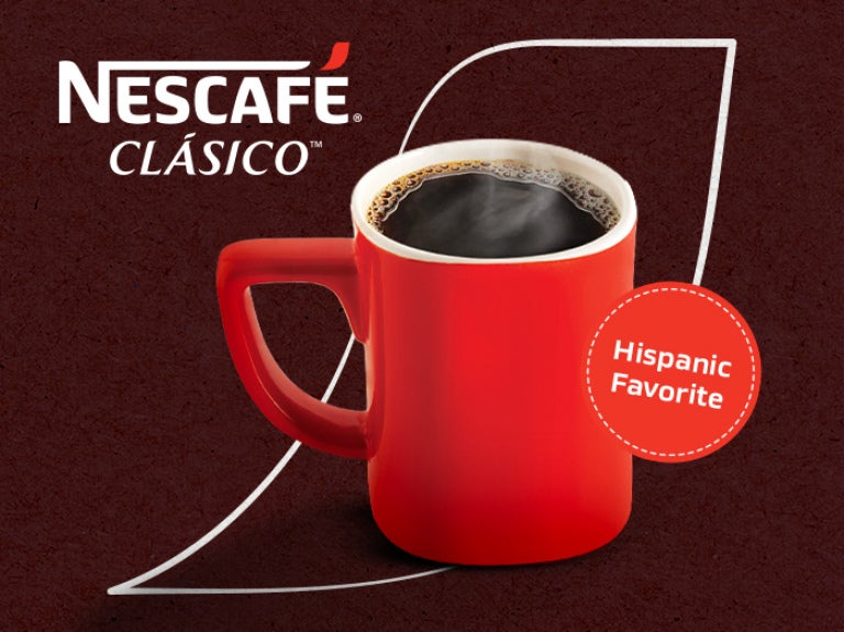 Steaming mug of Nescafé Clásico, a popular coffee choice among Hispanic coffee drinkers.