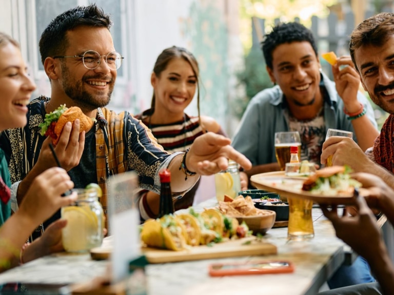 group of people eating at a table