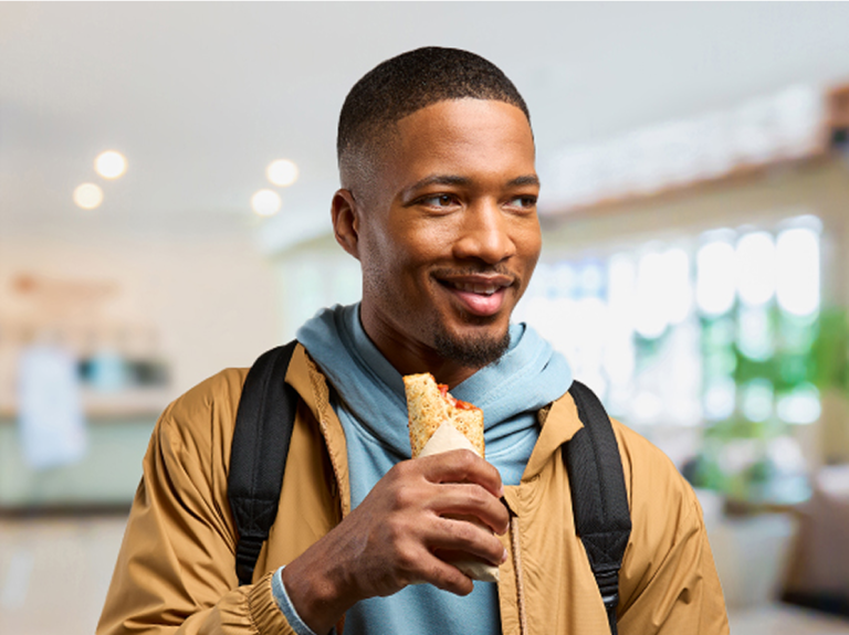 man holding hot pocket