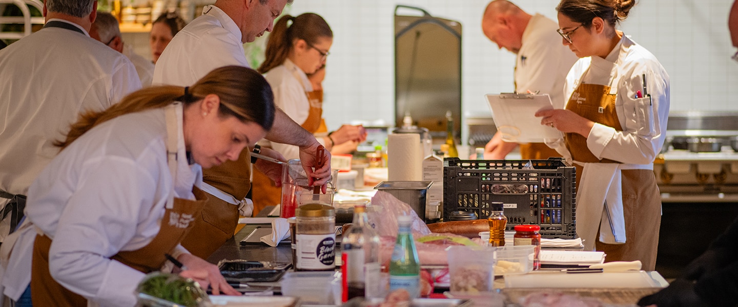 Chefs working in kitchen