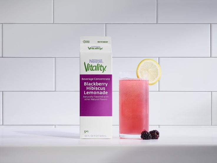 vitality blackberry hibiscus in carton and juice in glass