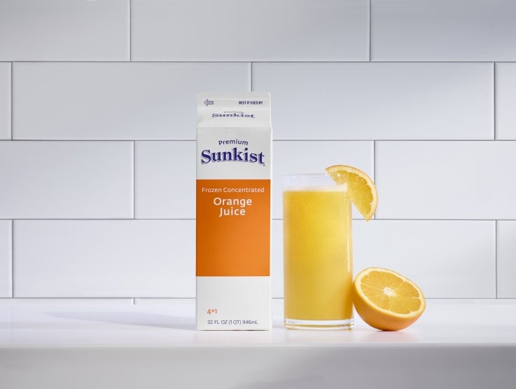 Sunkist orange juice in carton and glass