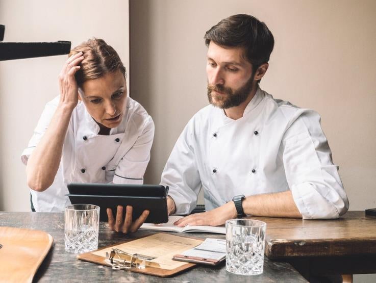 chefs menu planning at table