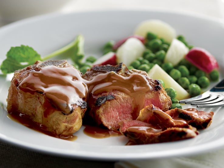 white plate with beef and vegetables