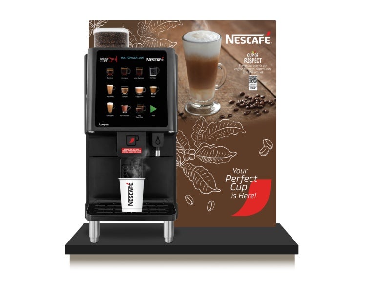 NESCAFE Total Barista 30 Bean-To-Cup Coffee Machine with back drop