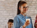 woman holding coffee cup