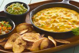 Queso Fundido with Plantain Chips with Trio Cheese Sauce