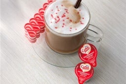 clear coffee mug with peppermint mocha creamer and coffee mate tubs