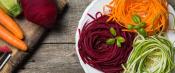 Plate of spiralized vegetables made from carrot, zucchini, and beetroot
