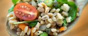 Wooden spoon with farro salad