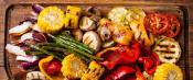 Wooden platter of grilled vegetables