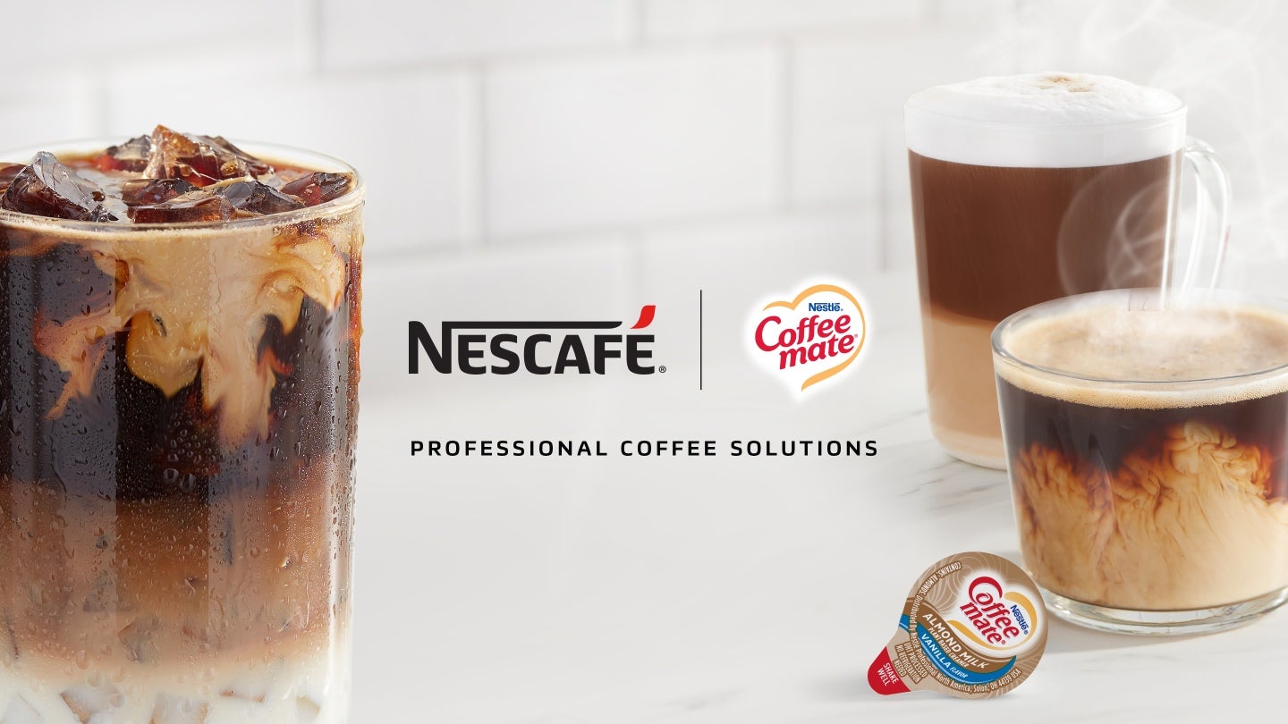 Three cups of newly brewed hot and cold Nescafe coffee drinks with coffee mate creamer on a white table