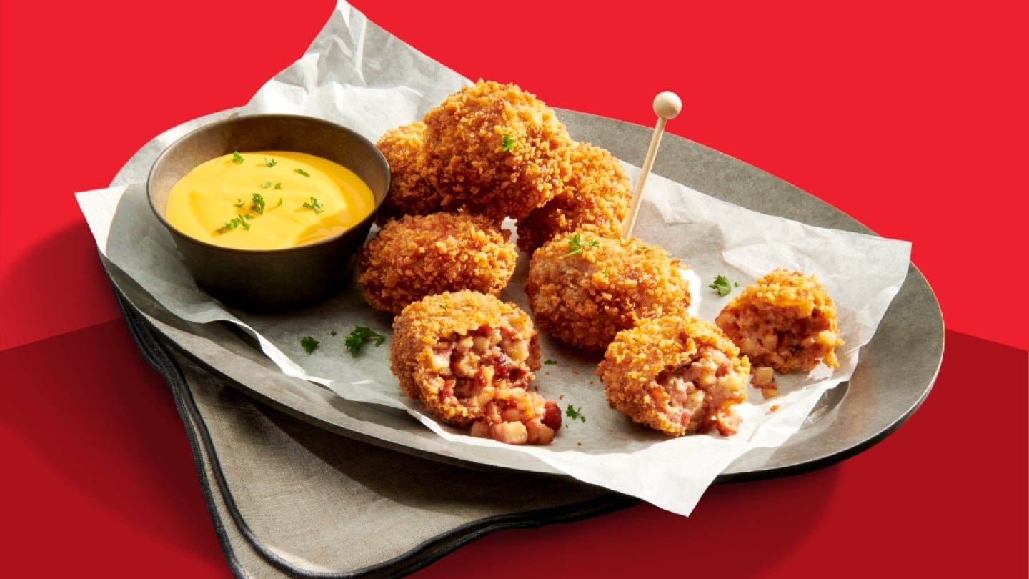 filled fried appetizer with cheese sauce