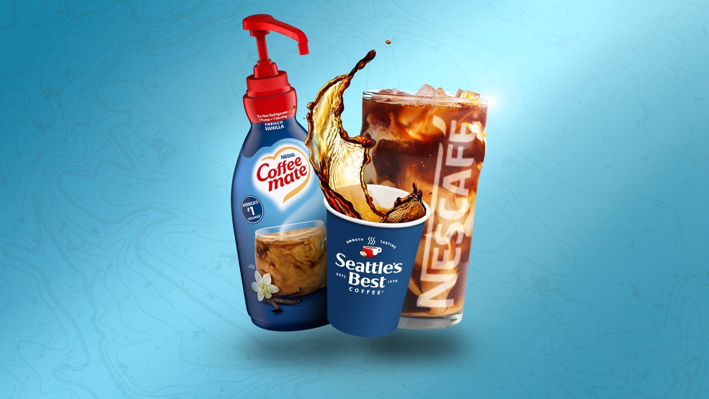 A glass of NESCAFÉ iced coffee with swirling  creamer, a classic, hot cup of coffee from  Seattle’s Best Coffee and a Coffee 