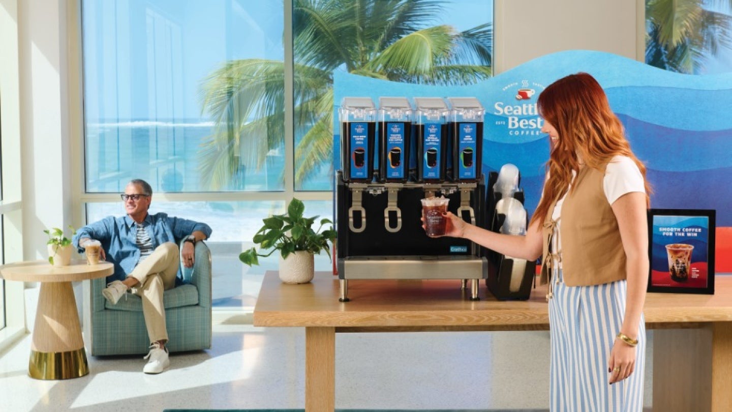 Lady at coffee machine